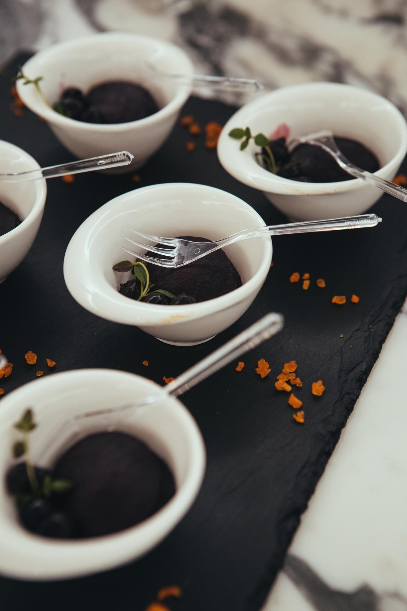 Set table with plated tasting menu samples